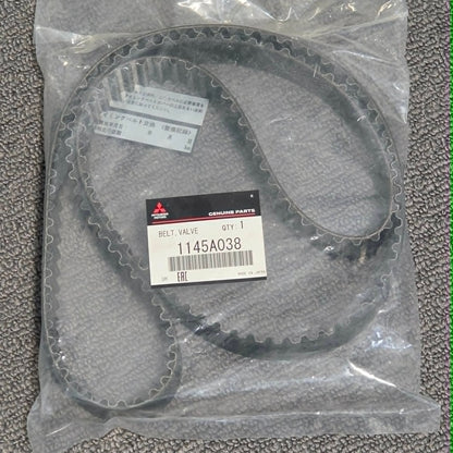 Packaged belt with a label on a textured gray surface